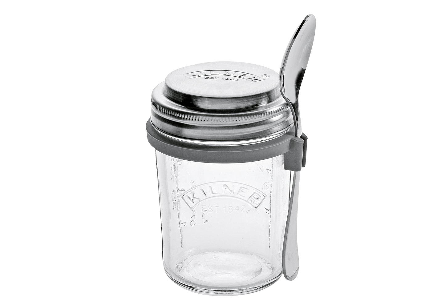 Frühstücksglas mit Löffel und Rezeptbuch