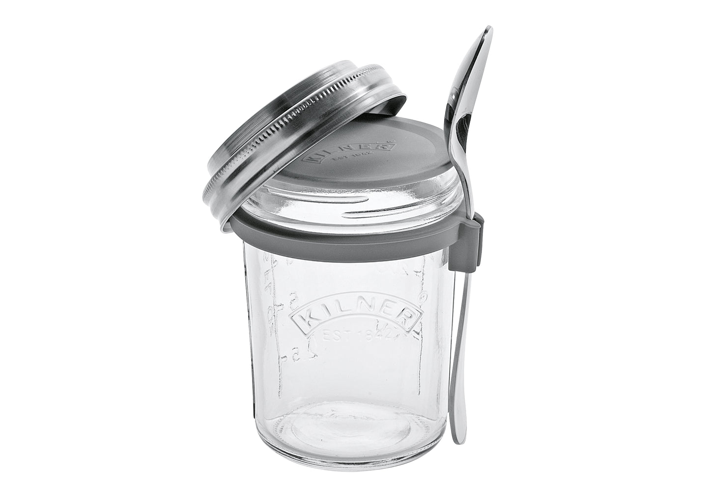 Frühstücksglas mit Löffel und Rezeptbuch